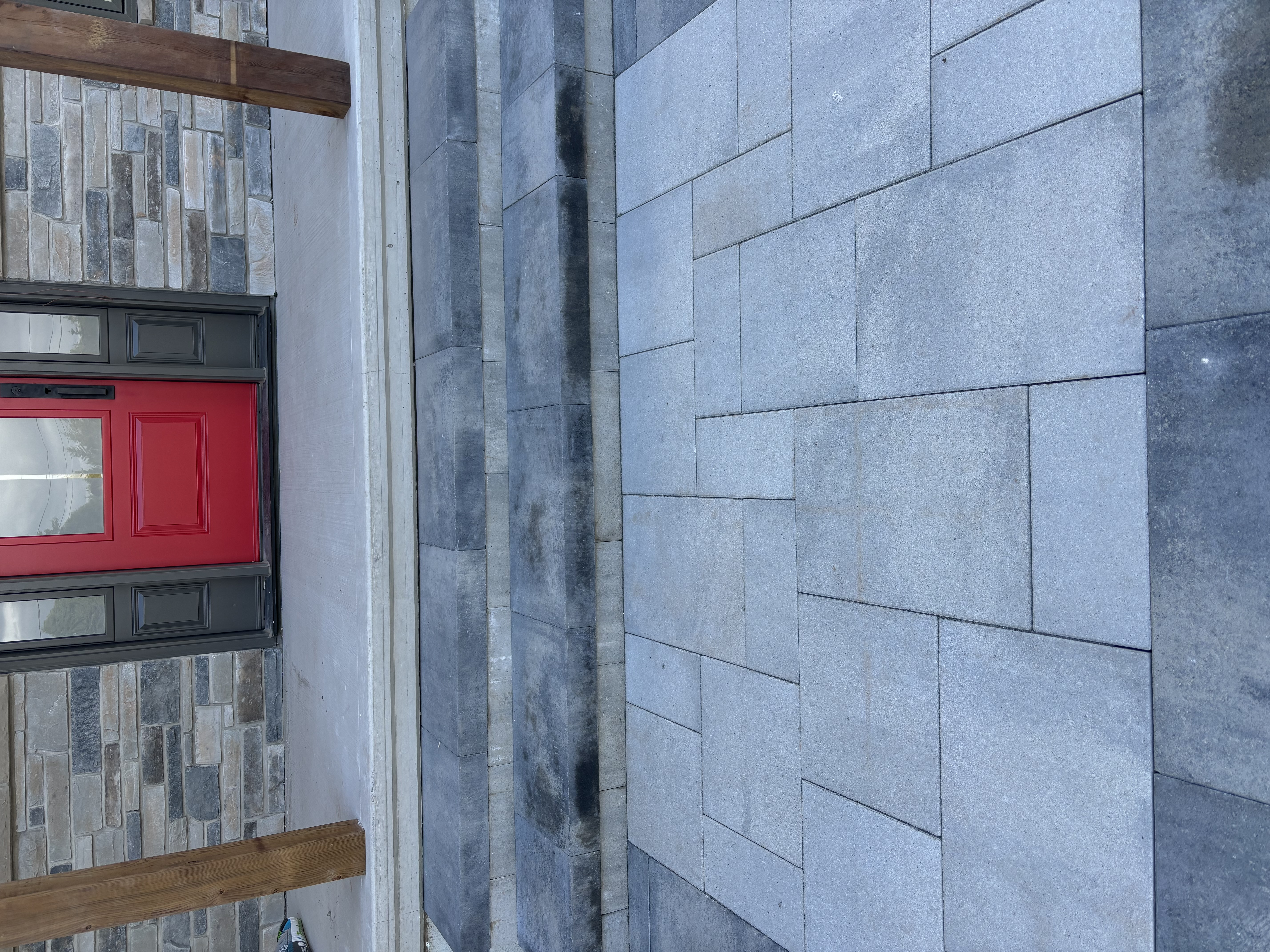 Paver entryway steps leading to front door