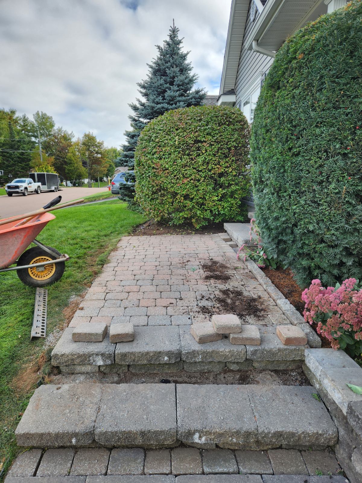 Paver walkway with steps being installed